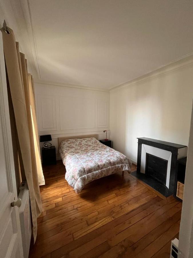 Cosy Appartement Paris A Deux Pas Курбьовоа Екстериор снимка